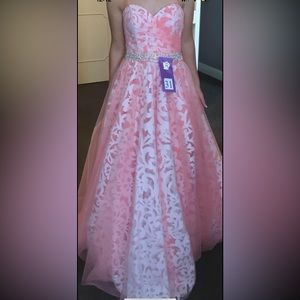 Pink and white Rachel Allan prom dress.